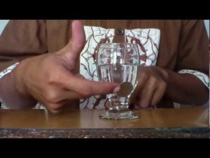 sulap - coin menembus gelas